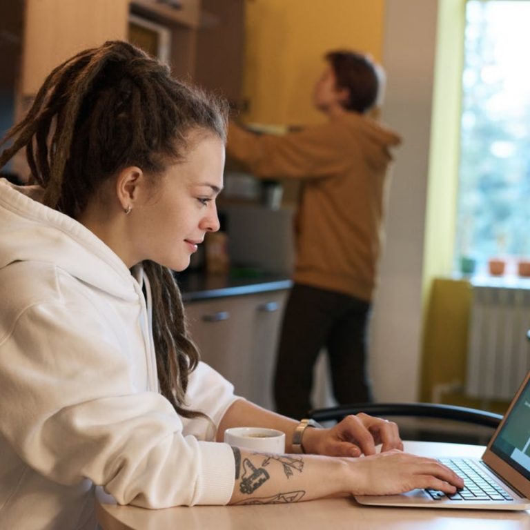 a woman using a laptop