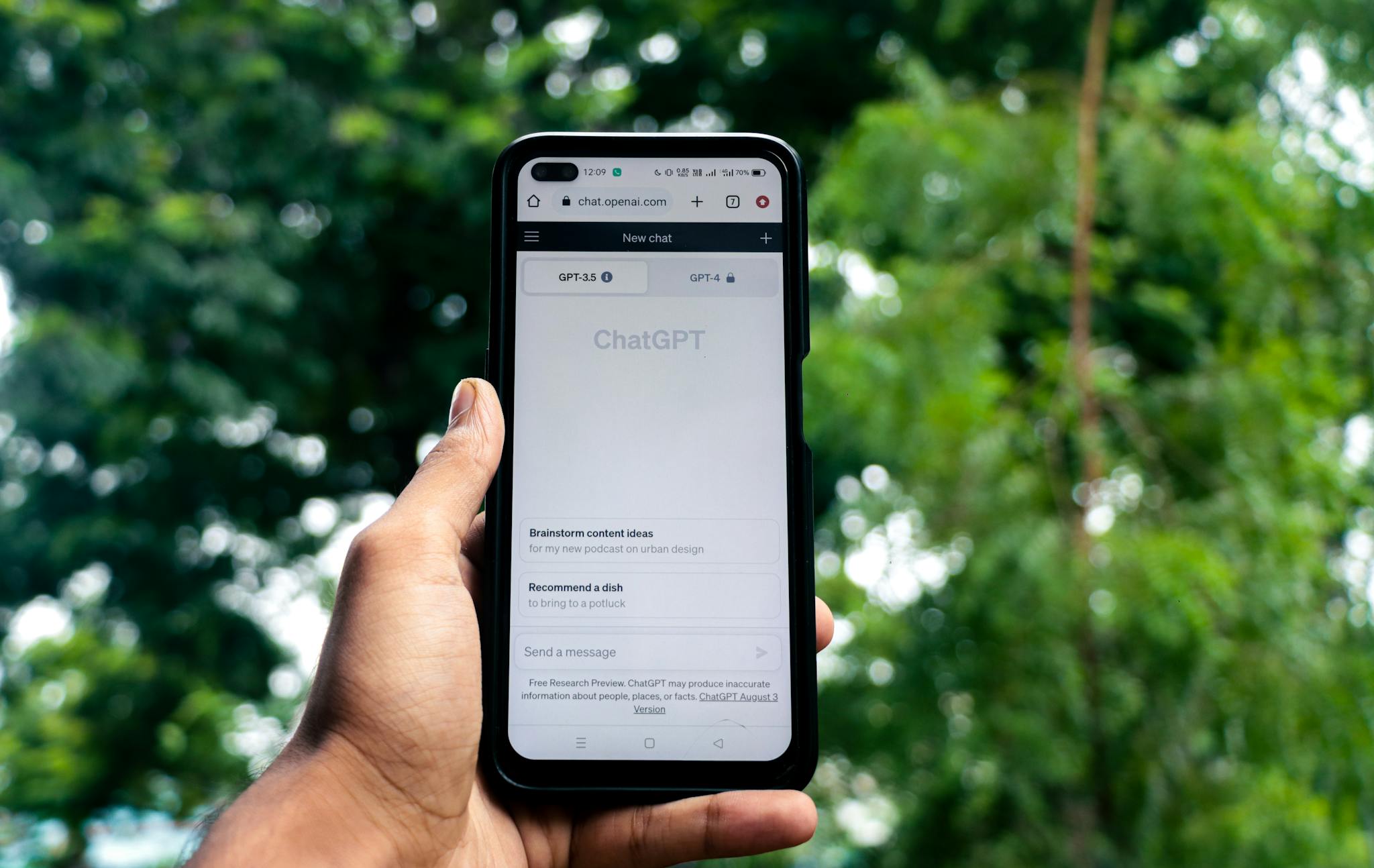 close up of a hand holding a smartphone
